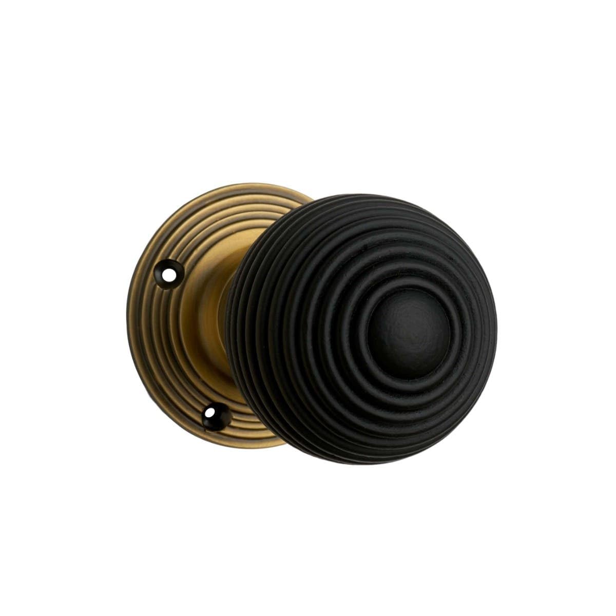 Designer Levers Queen Anne Reeded Door Knob - Natural Wood/Antique Brass