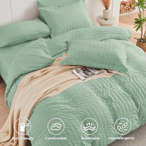 Image of HYMOKEGE Sage Green Oversized King Comforter Set Seersucker 7 Pieces, All Season Luxury Bed in a Bag for Bedroom, Bedding Set with Comforter, Sheets, Pillowcases & Shams