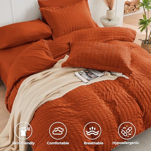 Image of HYMOKEGE Burnt Orange Oversized Queen Comforter Set Seersucker 7 Pieces, All Season Luxury Bed in a Bag for Bedroom, Bedding Set with Comforter, Sheets, Pillowcases & Shams