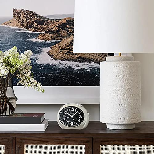 Image of Seiko Elegant Oval Silver Plastic Case Black Dial Analog LumiBrite Alarm Table Clock (Size: 11.2 x 6.8 x 8.8 CM | Weight: 130 gram)