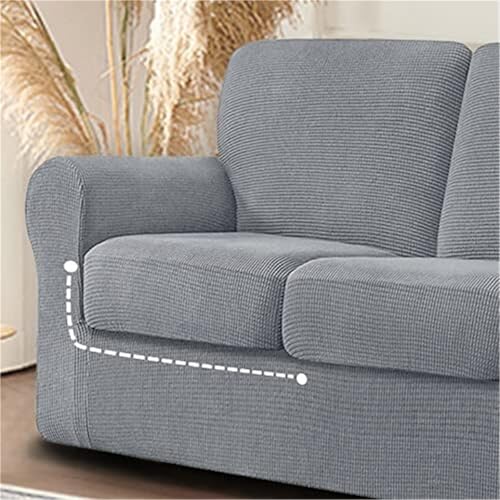 Housse de canapé extensible gris clair pour un salon familial propre