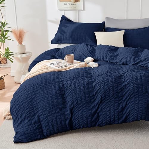 Image of HYMOKEGE Navy Blue /Light Grey King Size Comforter Set Seersucker 7 Pieces, All Season Luxury Bed in a Bag for Bedroom, Bedding Set with Comforter, Sheets, Pillowcases & Shams