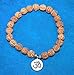 GRI9 Om Rudraksha Bracelet For Men & Women With Lord Shiva Om Mahakal Mahadev Elastic Stretchable Rudraksha Bracelet (Om Design)