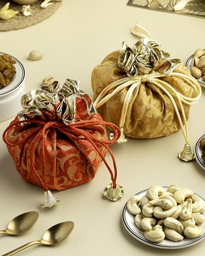 Image of Hyperfoods Rakhi Gift Hamper for Brother Rawfruit's Handcrafted Potli Pack of 4 Almond Cashew Raisins Pistachios 495 Grams with Thali Roli & Rice Dry Fruits Gift Pack Rakhi for Brother with Dry Fruit
