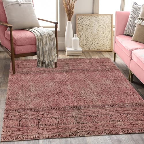 Tapis géométrique fait main en coton d'artisanat durable avec pompons chic