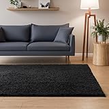 Interiyou Tapis Poils Longs Sofia   60x120 Noir   Moelleux et uni   Lavable et antidérapant   Fibres Douces pour Salon, Salle à Manger, Cuisine, Couloir