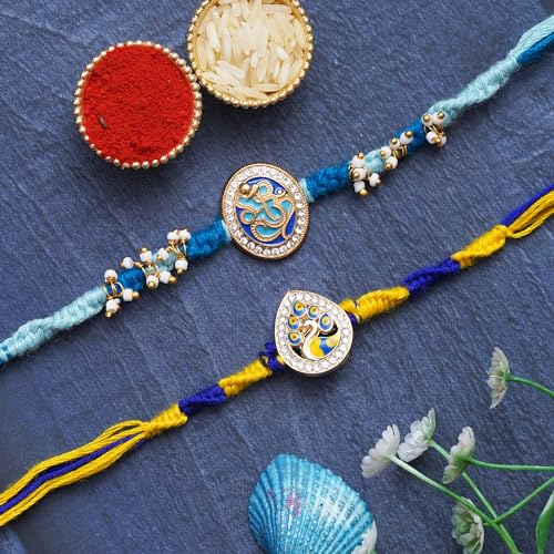 Image of eCraftIndia Set of 2 Lord Ganesha & Beautiful Peacock Rakhis, Best Bro Ever Fridge Magnet with Roli Chawal Pack - Rakhis for Brother, Bhabhi, Kids