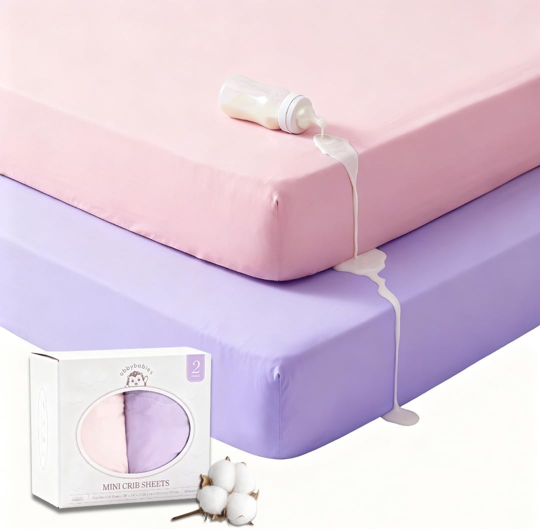 Organic Cotton Crib Sheet 2 Pack, Mini Crib Sheets 38x24x8 Jersey Knit, Waterproof Crib Sheets with Laminated TPU, Neutral Baby Bedding for Boys and Girls (Girl: Light Pink, Light Purple)