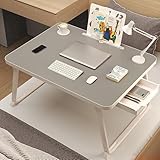 Utilisation polyvalente dans plusieurs scènes : cette table de chevet pliable est polyvalente, vous permettant de travailler ou d'étudier n'importe où et n'importe quand. Que vous préfériez travailler dans une baie vitrée sur le canapé ou sur le tapis, ce bureau pliable peut s'adapter à la scène que vous avez choisie. C'est le compagnon idéal pour ceux qui recherchent une table pliante portable qui s'adapte à leur style de vie dynamique.