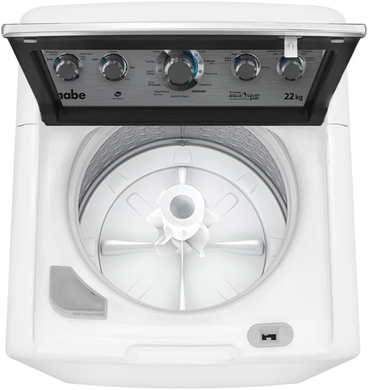 Top-down view of the Mabe washing machine with its lid open, showing the large wash drum and agitator inside.
