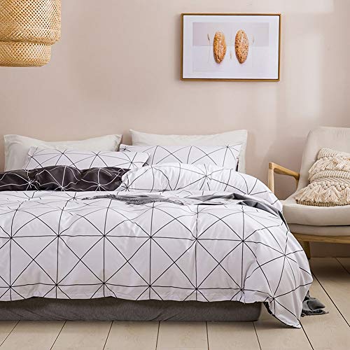 Housse de couette rayée et géométrique noire blanche en textile souple