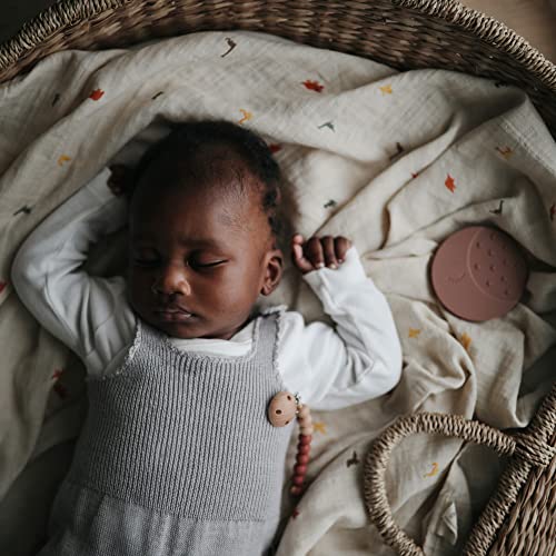 Image of mushie Muslin Baby Swaddle Blanket | 100% Organic Cotton (Dinosaurs)