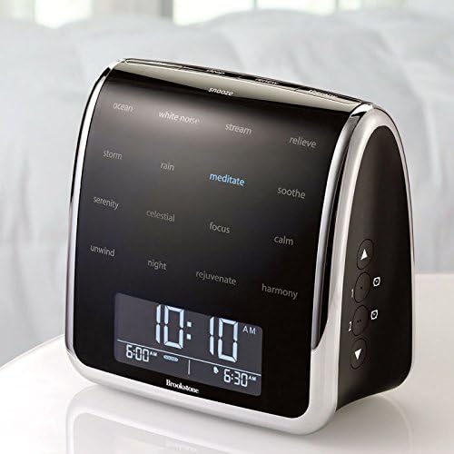 Close-up of the Brookstone Tranquil Moments machine display showing time and alarm settings