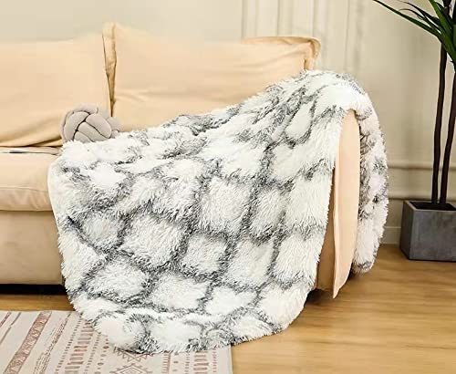 Couverture canapé fausse fourrure épaisse pour vos soirées cocooning au salon cet hiver