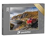 Klassisches Qualitäts-Puzzle in edler Anthrazit-Schachtel mit Puzzlemotiv als Vorlage
