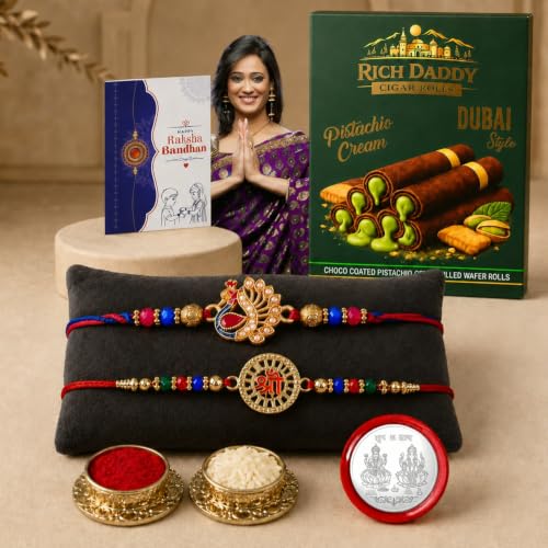 Image of Oblivion Rakhi for Brother Set of 2 with Rich Daddy Pistachio Cream Filled Wafer Rolls 140g, Silver Color Pooja Coin, Tilak Set & Raksha Bandhan Greeting Card | Premium Rakhi Gift Combo for Bhai