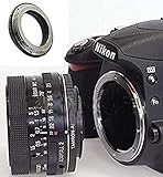 Ring aus Metall, geeignet für die Montage von Tamron Adaptall 2-Objektiven auf digitale und analoge Fotokameras der Marke Nikon AF und AI.