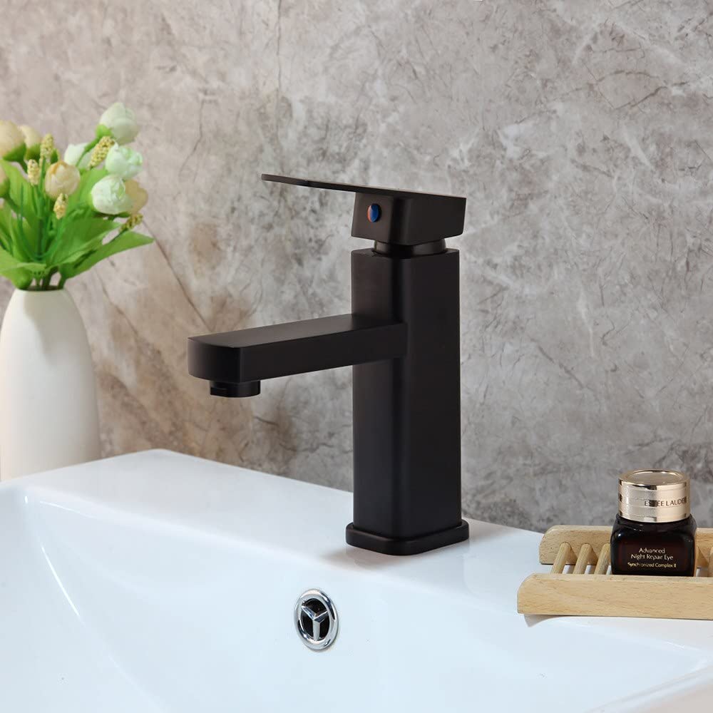 Mitigeur salle de bain noir et chrome pour lavabo eau chaude et froide monté sur pont