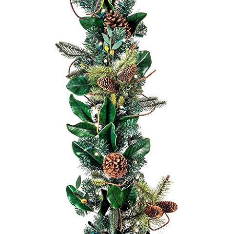 [9 Foot Artificial Christmas Garland] - Magnolia Leaf Collection - Natural Decoration - Pre Lit with 100 Warm Clear Colored LED Mini Lights - Includes Remote Controlled Battery Powered Timer Cover