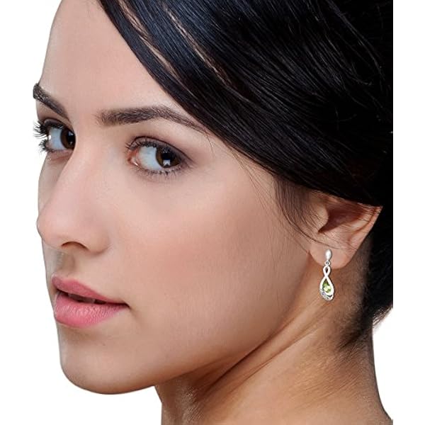 Pendientes de mujer Miore de plata de ley 925 con peridotos y circonitas. Pendientes con piedras semipreciosas hipoalergénicas. Stud y cierre de mariposa.