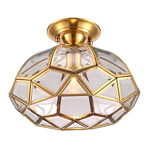 Lumière suspendue en or brossé pour une chambre cocooning