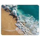 Description du motif : plage de sable turquoise-bleu, écume de mer au bord de l'océan