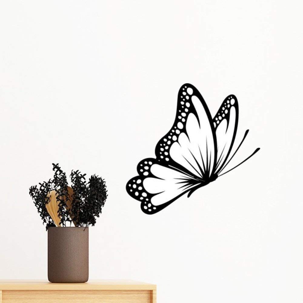 Sticker mural amovible papillon pour cacher les imperfections d'un mur