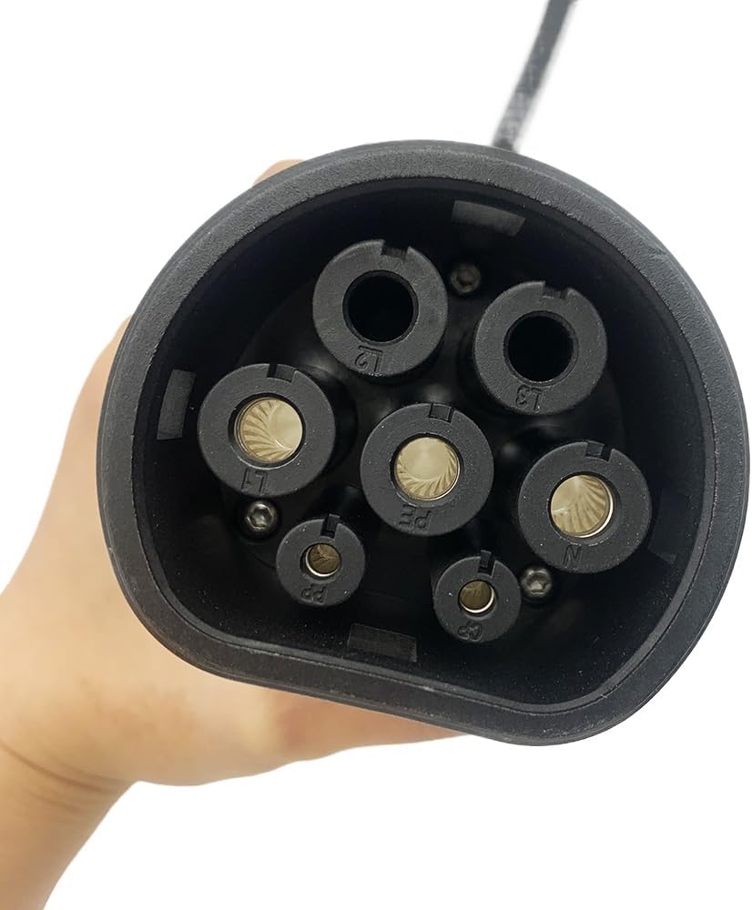Close-up view of the pins inside a Type 2 EV charging connector.
