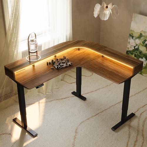 Image of HUANUO Electric L Shaped Stadning Desk with LED Strip & Power Outrlets, 63 inch x 55 inch 2-Tier Height Adjustable Sit Stand up Desk with Power Strip Holder, Ergonomic Corner Computer Table, Walnut