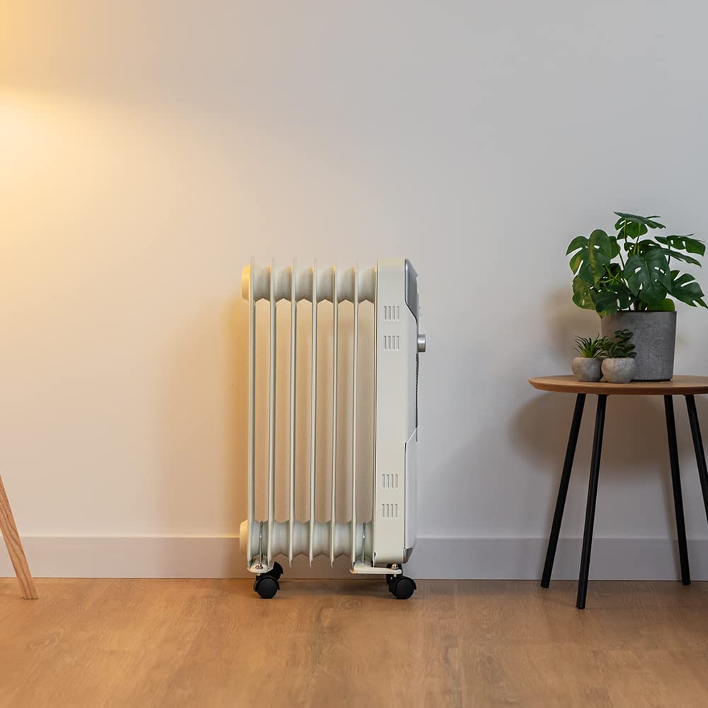 Cecotec Radiador Eléctrico de Aceite ReadyWarm 7000 Space. 7 Módulos, Bajo Consumo, 1500 W, 3 Niveles, Recogecables, Sistema de Seguridad, Ruedas, 15 m2