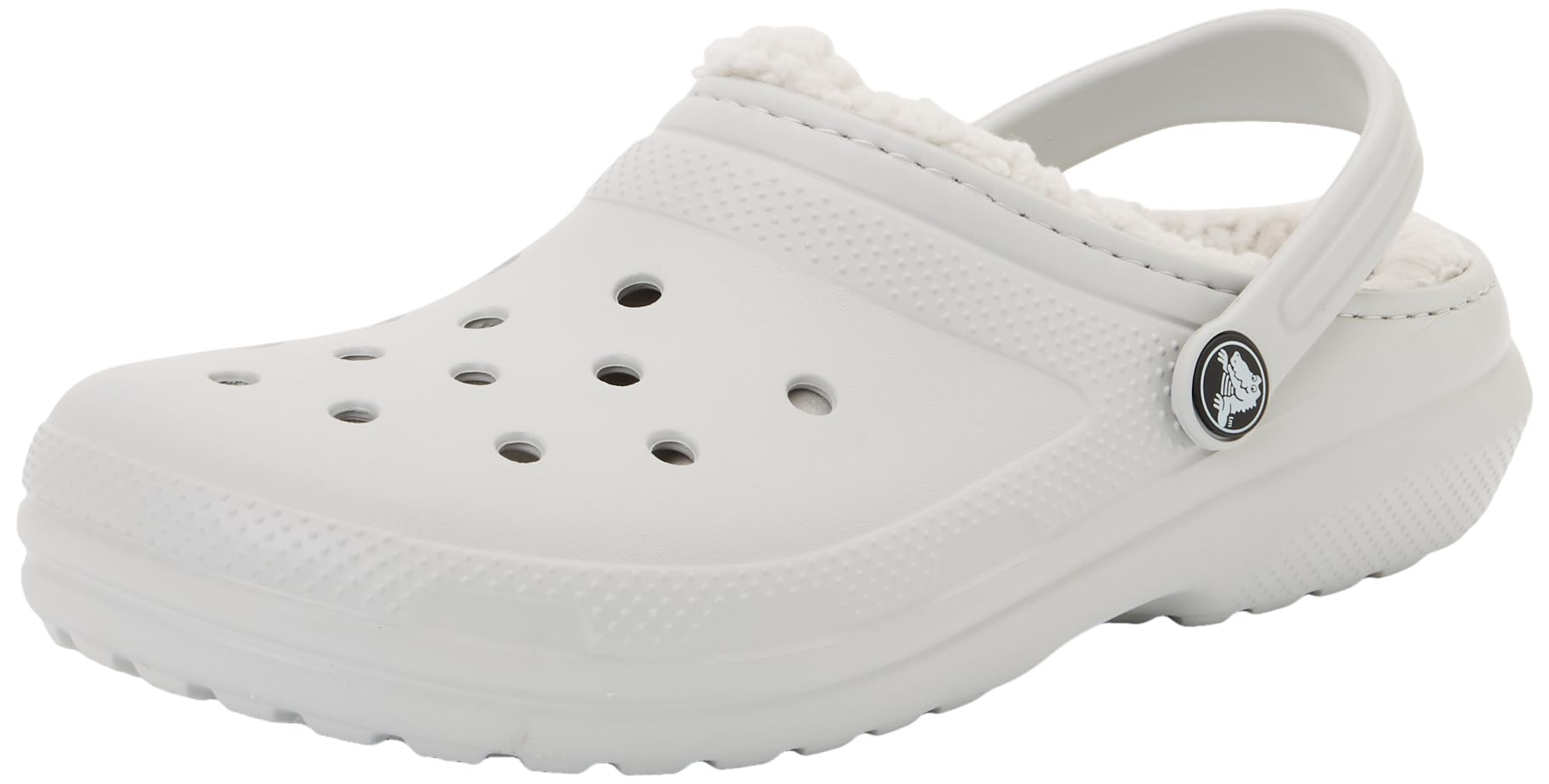 Primer plano del forro interior de los zuecos Crocs Classic Lined Clog K, destacando su textura cálida.