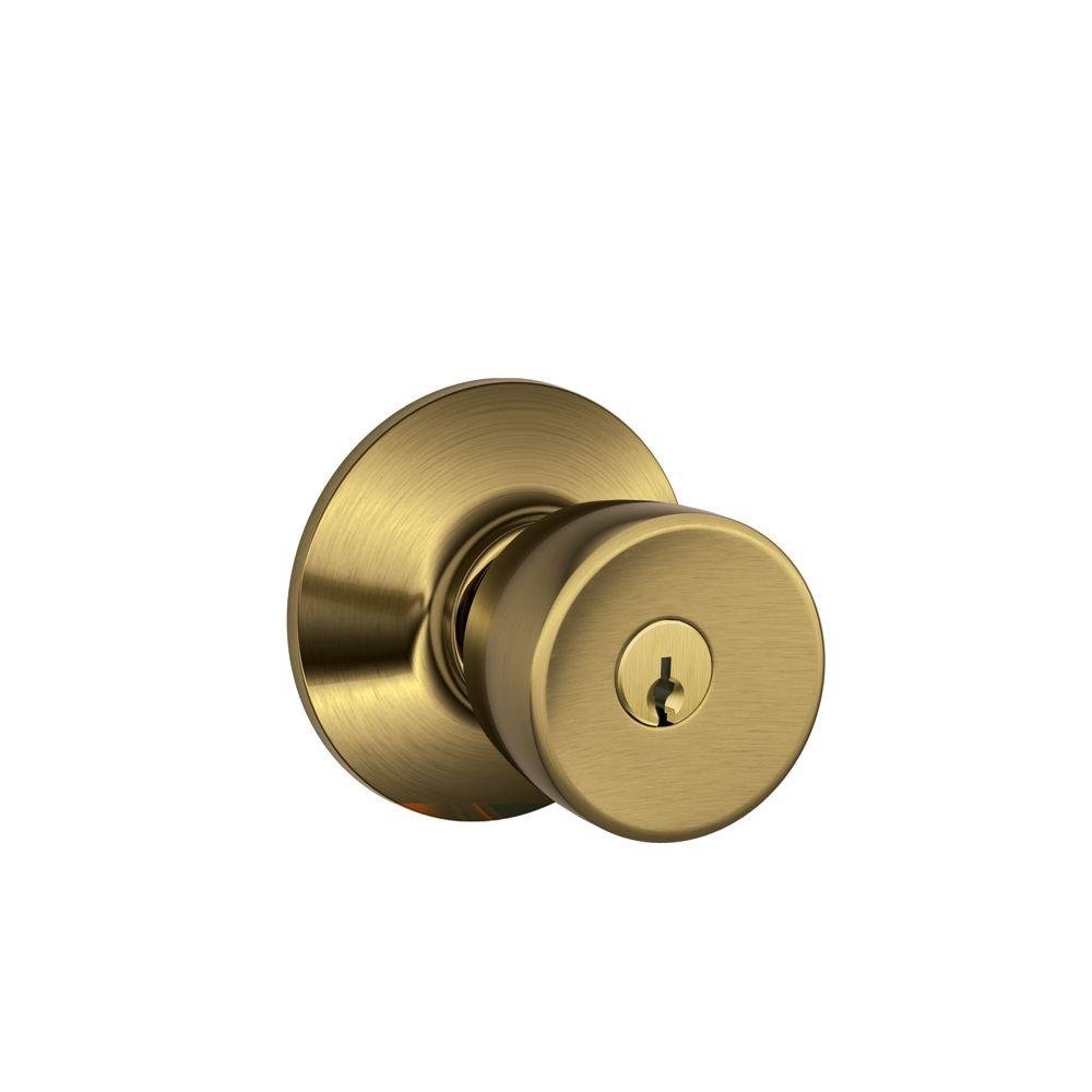 Schlage F51A BEL 609 Bell Knob Keyed Entry Lock, Antique Brass — image 1
