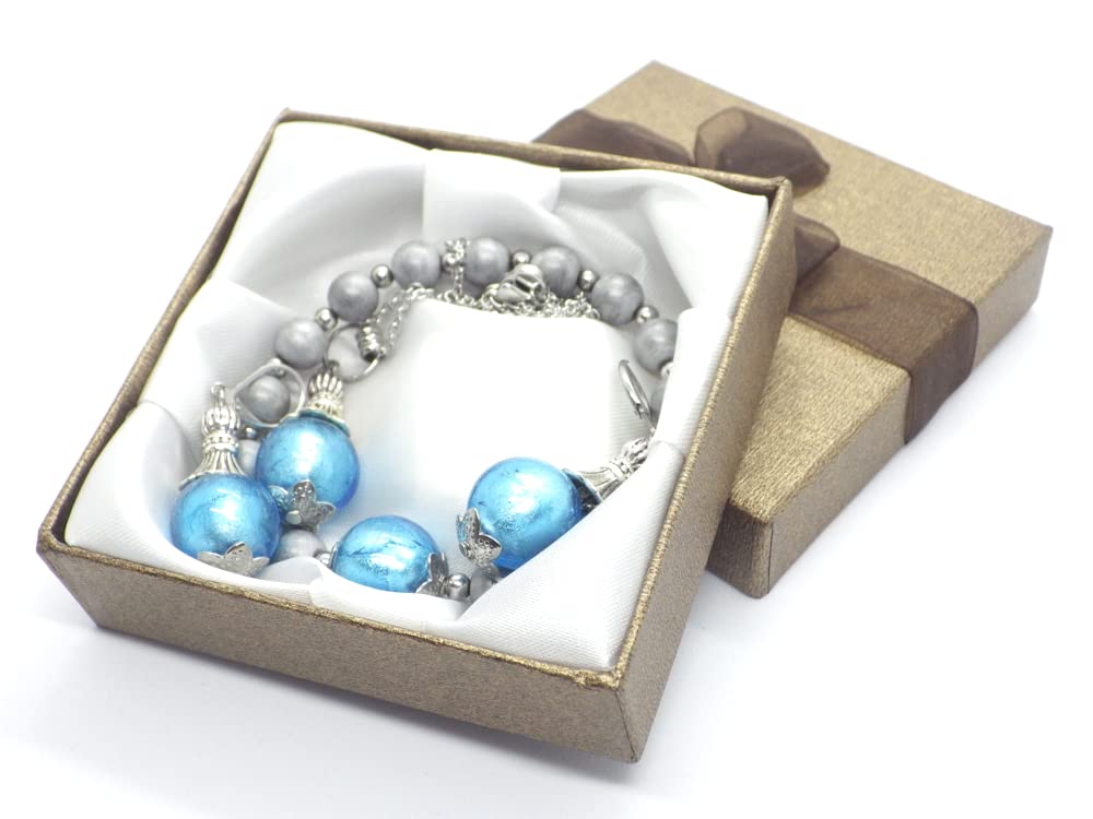Conjunto de joyería pendientes, collar y pulsera en acero inoxidable, hematites y cuentas de cristal de Murano azul turquesa