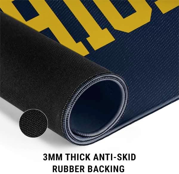 Skinit Large Gaming Mouse Pad - Officially Licensed University of Michigan Blue Jersey Design with Stitched Edges, Waterproof, Non-Slip Rubber Base, Desk Mat for Keyboard & Mouse, 31.5" x 11.8" inches