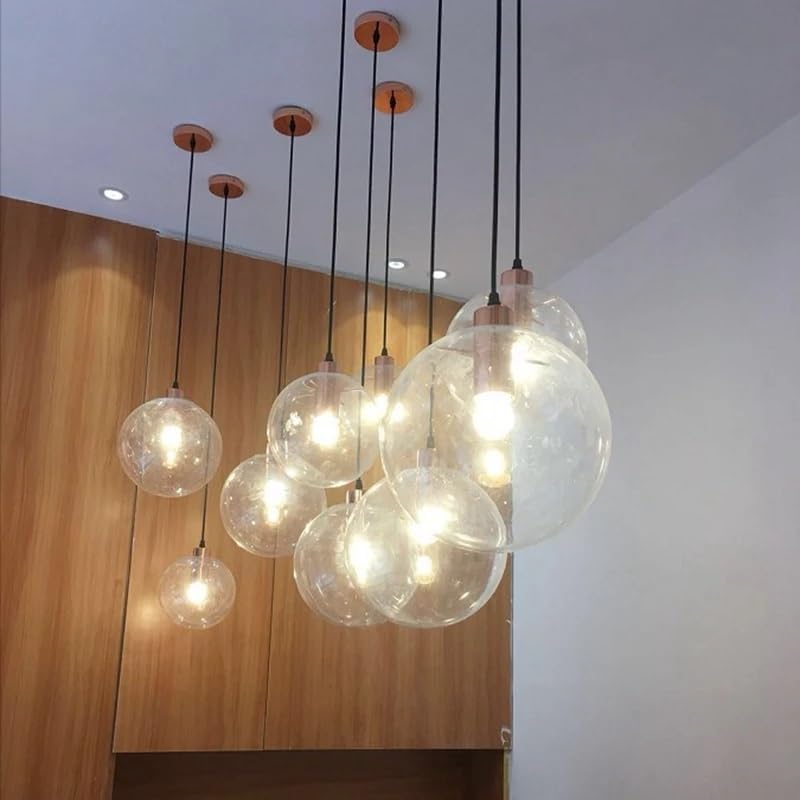 Suspension luminaire salon moderne en verre doré pour ambiance loft décontracté
