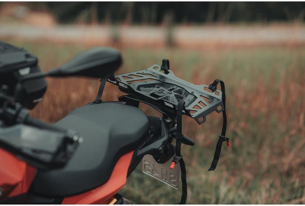 Motorcycle with rear rack installed, ready for bag attachment.