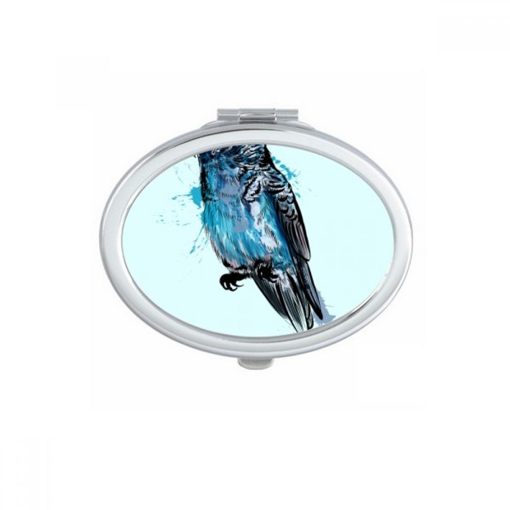 Miroir de poche de forme ovale au motif perroquet bleu noir