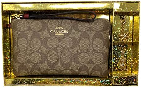 coach wristlet with charms