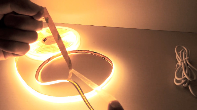 Image of 12V COB LED Strip Lights Warm White 3000K, 16.4 ft Dotless High CRI 93+Flexible & Cuttable Tape Lights for Bedroom, Under Cabinet, Living Room, RV Interior Lighting(Power Supply Not Included)