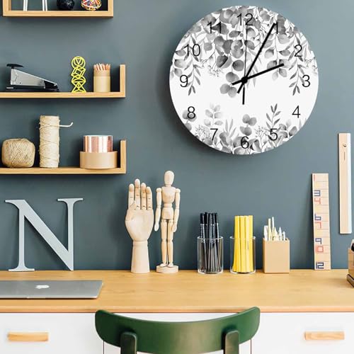Grande horloge murale botanique au design eucalyptus raffiné
