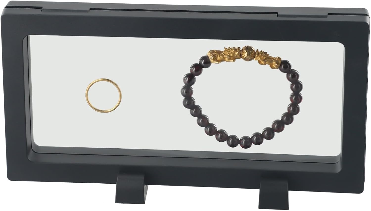 Multi-purpose coin holder for displaying jewellery, stamps and other souvenirs