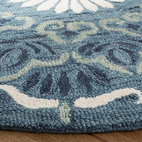 Tapete redondo artesanal Safavieh 6' azul e marfil miniatura 4