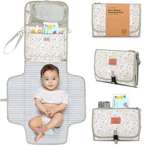 Image of KeaBabies Portable Diaper Changing Pad - Large Waterproof Baby Changing Mat, Compact Travel Diaper Clutch, Functional Pockets Fit Newborn Essentials, Wipeable & Padded Baby Changer (Prairie)