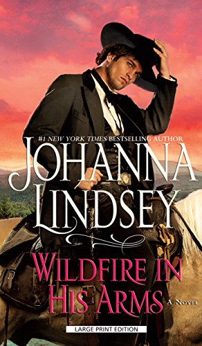 Wildfire in His Arms [Large Print] 1410479943 Book Cover