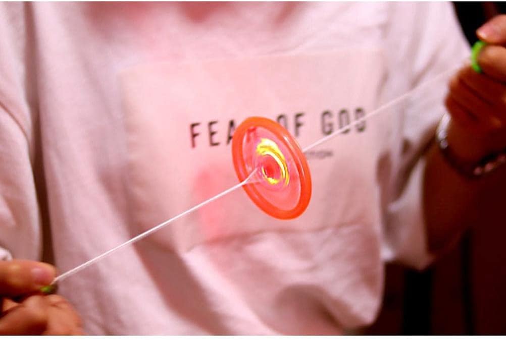 Vikye Flashing Gyro Toy, 10 Pcs Illuminated Spinning Top with Whistle Sound, Flywheel Decompression Toy with Colorful LED Light Activated by a String (Assorted Color)