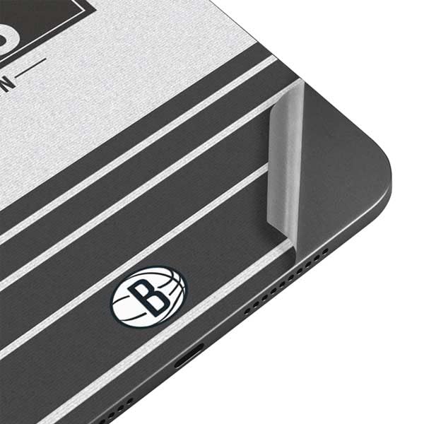 Skinit Decal Tablet Skin Compatible with iPad Mini 7 (2025) - Officially Licensed NBA Brooklyn Nets Static Design