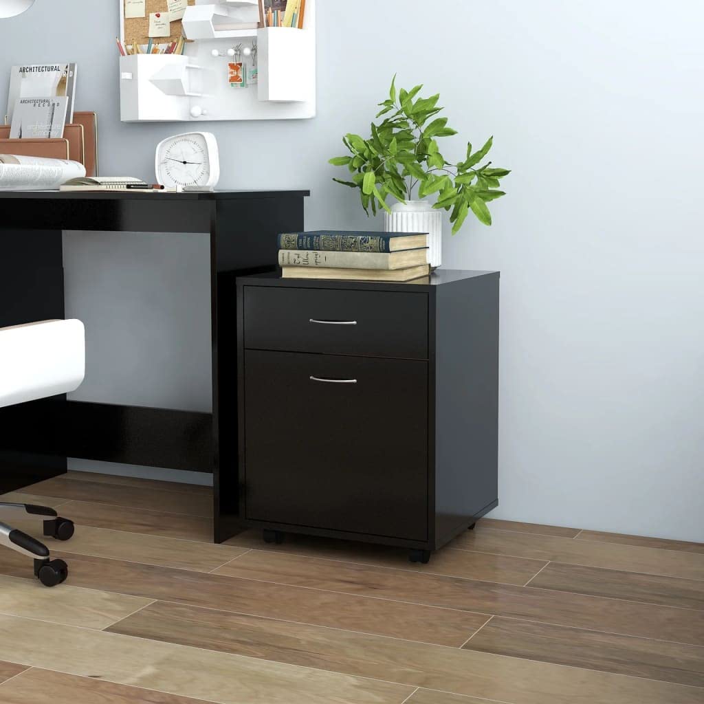 Petit meuble de bureau en bois noir à roulettes idéal pour organiser le télétravail