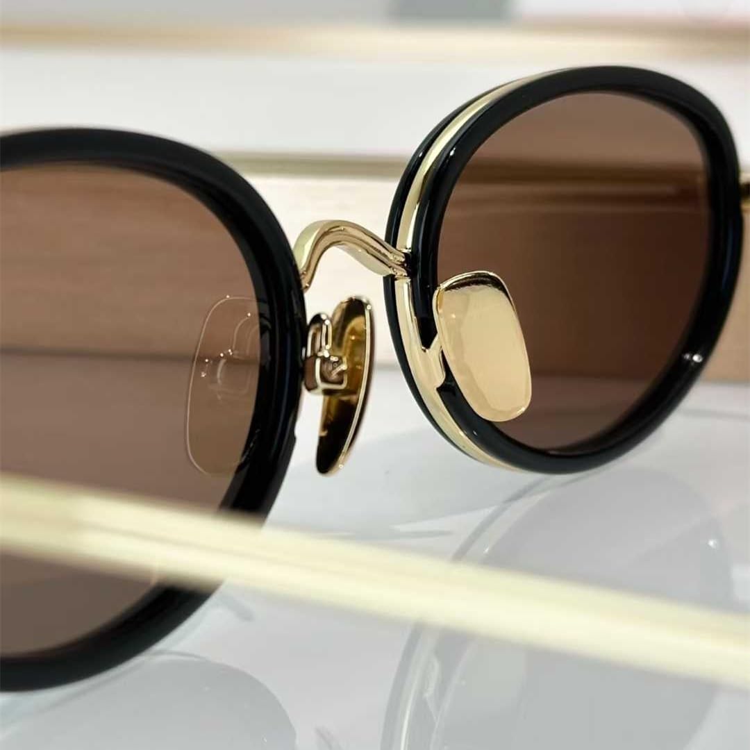 Gafas de sol con montura ovalada de metal, protección UV400, estilo retro.