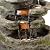 Alpine Corporation WIN1146 Outdoor Floor Cascading 8-Tiered Rock Garden Water Fountain with LED Lights, 58", Gray