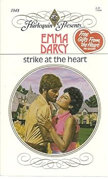 Paperback Strike at the Heart (Harlequin Presents) Book